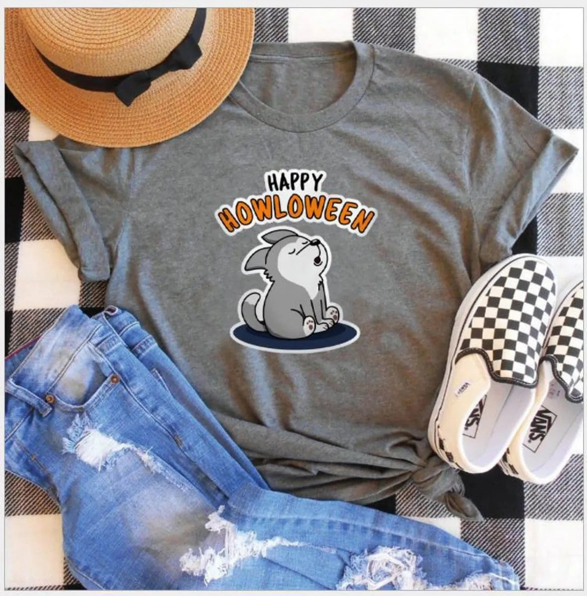 Women's Halloween T-Shirt by Homixa featuring a cheerful "Happy Howloween" graphic on a cotton fabric Halloween T-shirt.