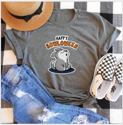 Women's Halloween T-Shirt by Homixa featuring a cheerful "Happy Howloween" graphic on a cotton fabric Halloween T-shirt.