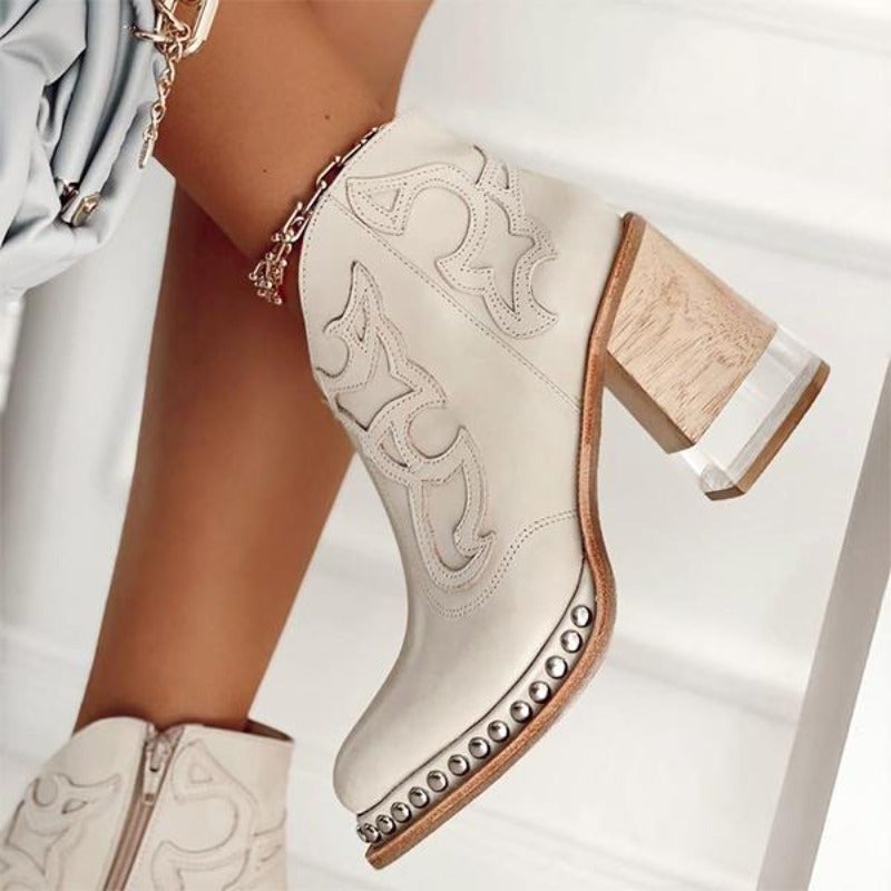 Homixa women's cowboy boots with relaxed fit, featuring stylish leather design and classic Western stitching.