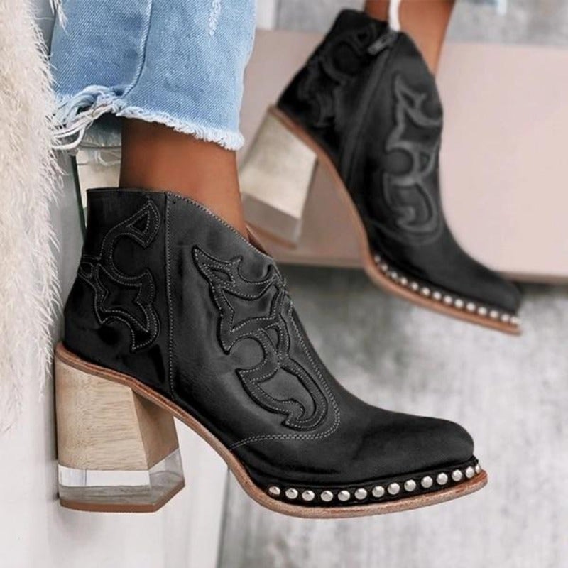 Homixa women's cowboy boots with relaxed fit, featuring classic leather design and decorative stitching, perfect for casual wear.