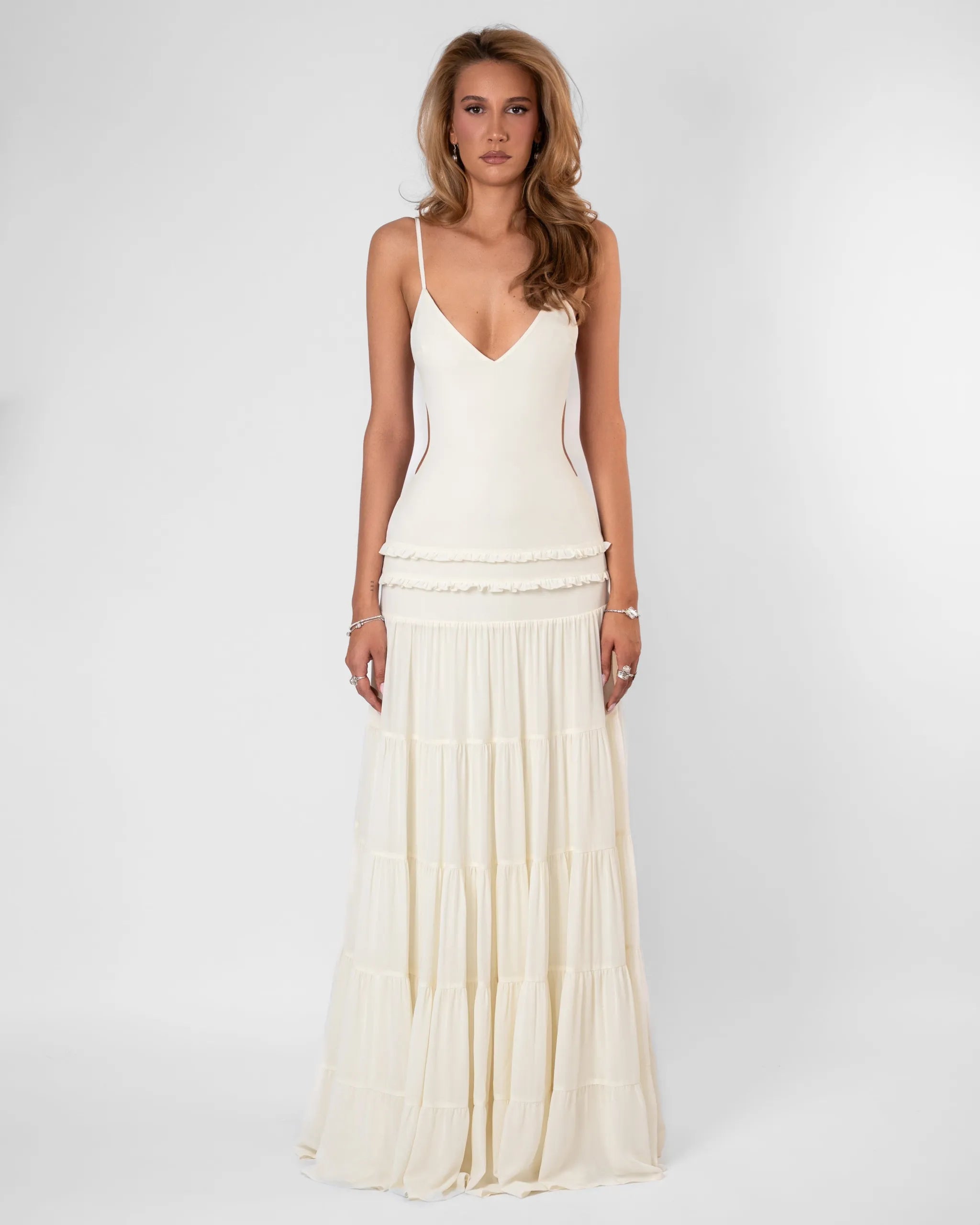 Women’s tiered spaghetti-strap maxi dress by Homixa featuring flowing fabric and a relaxed fit, perfect for summer or casual wear.