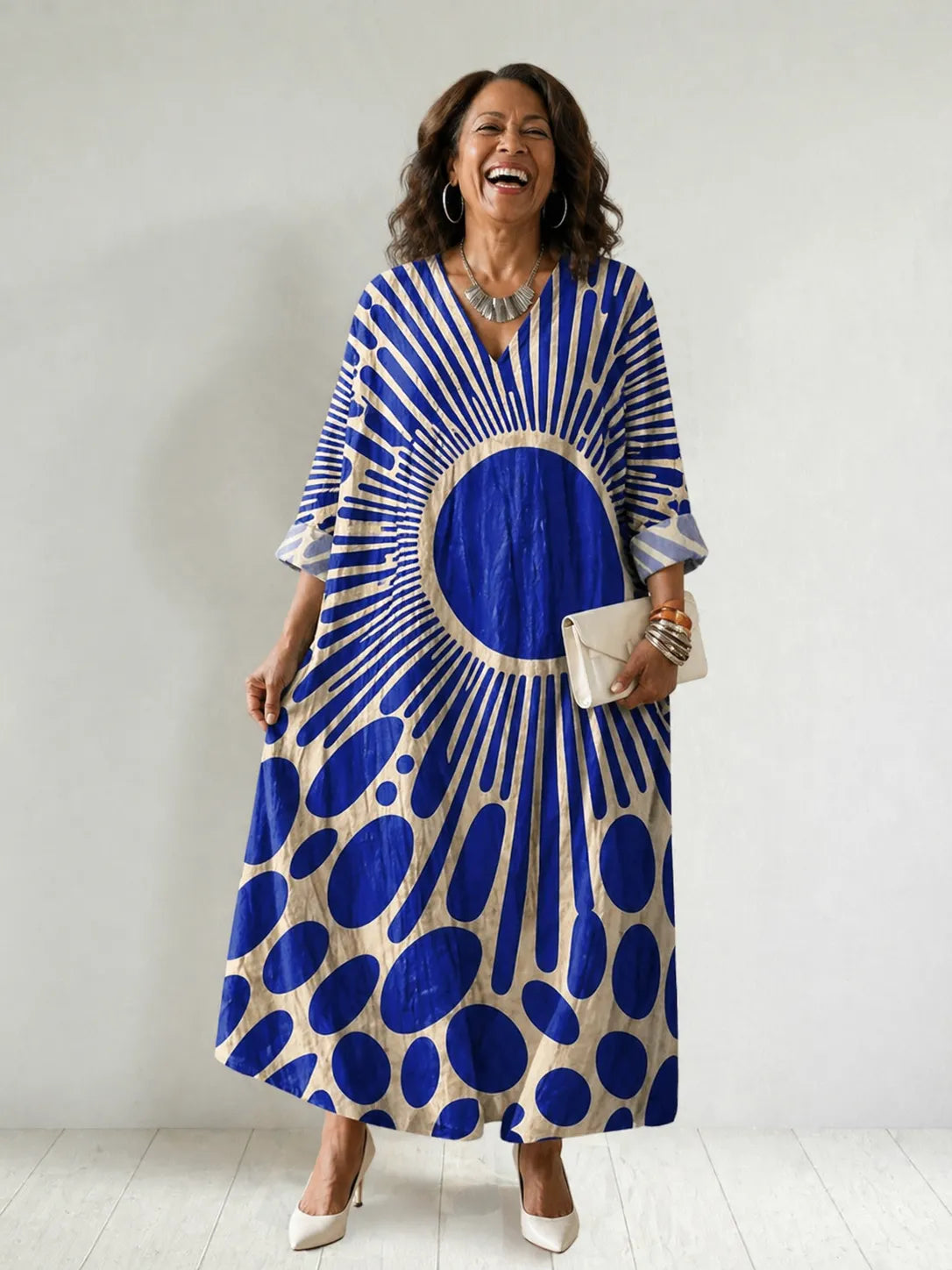 Homixa women's sunburst-print V-neck maxi dress featuring a flowing silhouette and vibrant pattern, perfect for warm weather.