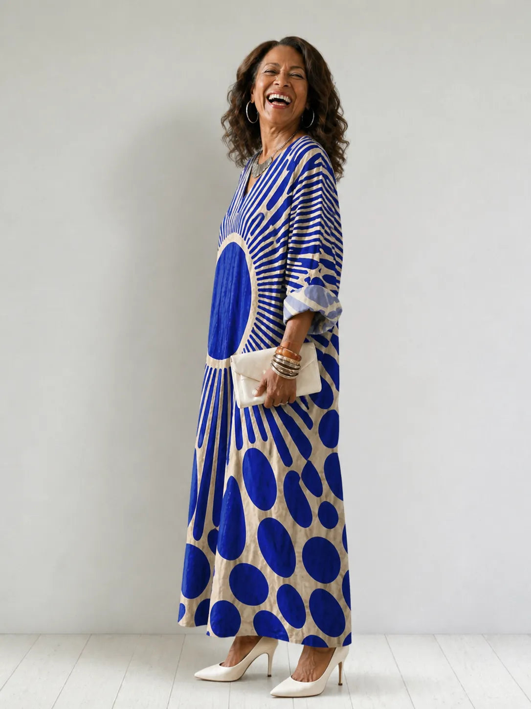 Homixa women's Sunburst-Print V-Neck Maxi Dress with flowing fabric and vibrant sunburst pattern, perfect for summer wear.
