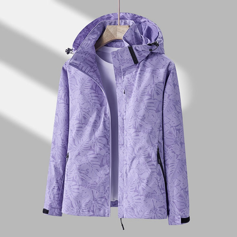 Women's Lunirel waterproof windproof hooded jacket with lightweight design and adjustable hood, perfect for outdoor protection.