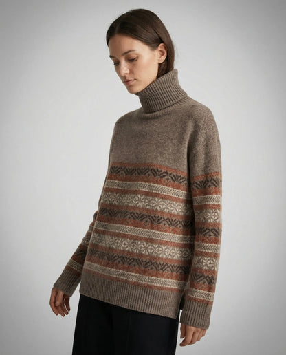 Homixa Lily women's fair-isle turtleneck sweater with patterned sleeves and ribbed cuffs, shown in a close-up image.