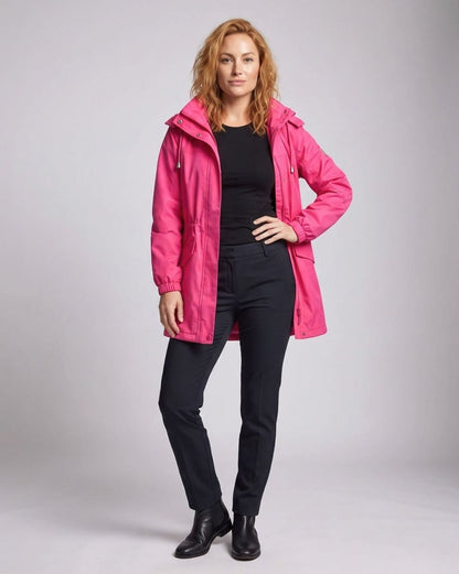 Homixa water-repellent longline parka with hood and adjustable drawstring waist, designed for weather protection and style.