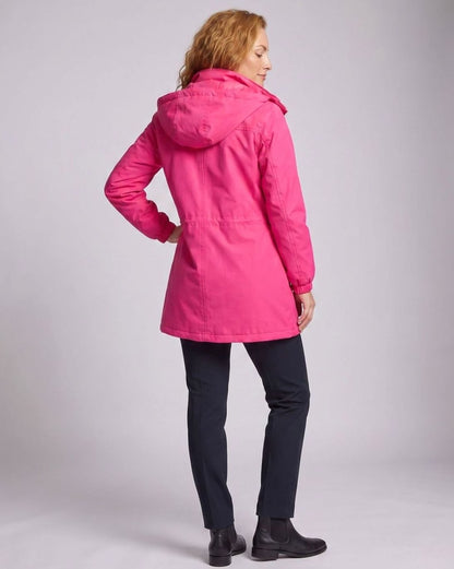 Homixa water-repellent longline parka with hood and adjustable drawstring waist, showcasing its sleek, protective design.