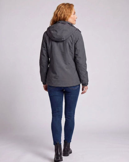 Homixa water-resistant hooded winter jacket with zip pockets and adjustable cuffs, perfect for cold, wet weather.