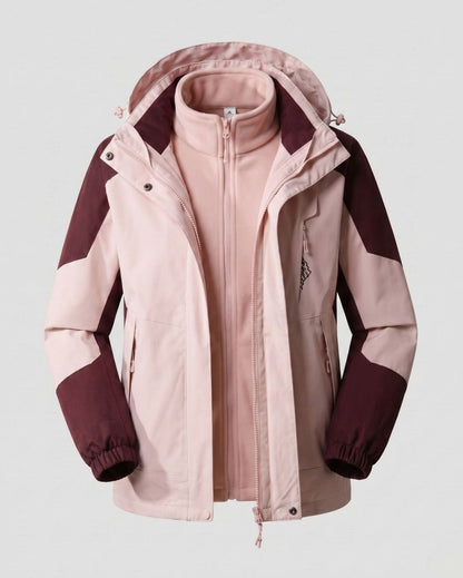 Homixa waterproof two-layer hooded outdoor jacket with adjustable hem and cuffs, shown on a model in a rugged outdoor setting.