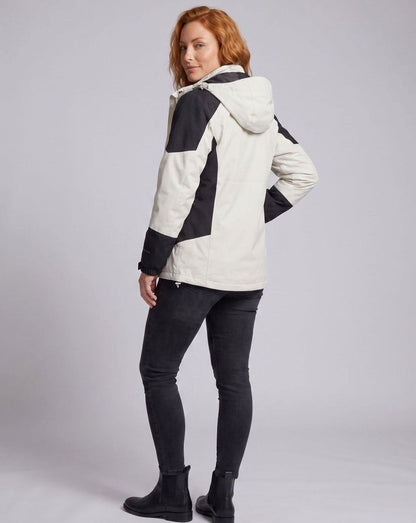 Homixa waterproof two-layer hooded outdoor jacket with adjustable hem and cuffs, shown on a mannequin in outdoor setting