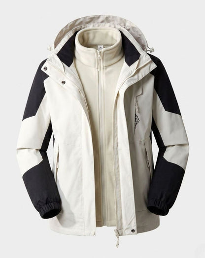 Homixa waterproof two-layer hooded outdoor jacket with adjustable hem and cuffs, shown in a forest setting.