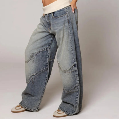 Women’s Y2K baggy wide-leg jeans by Lunirel featuring a ribbed waist and relaxed fit, shown on a model.