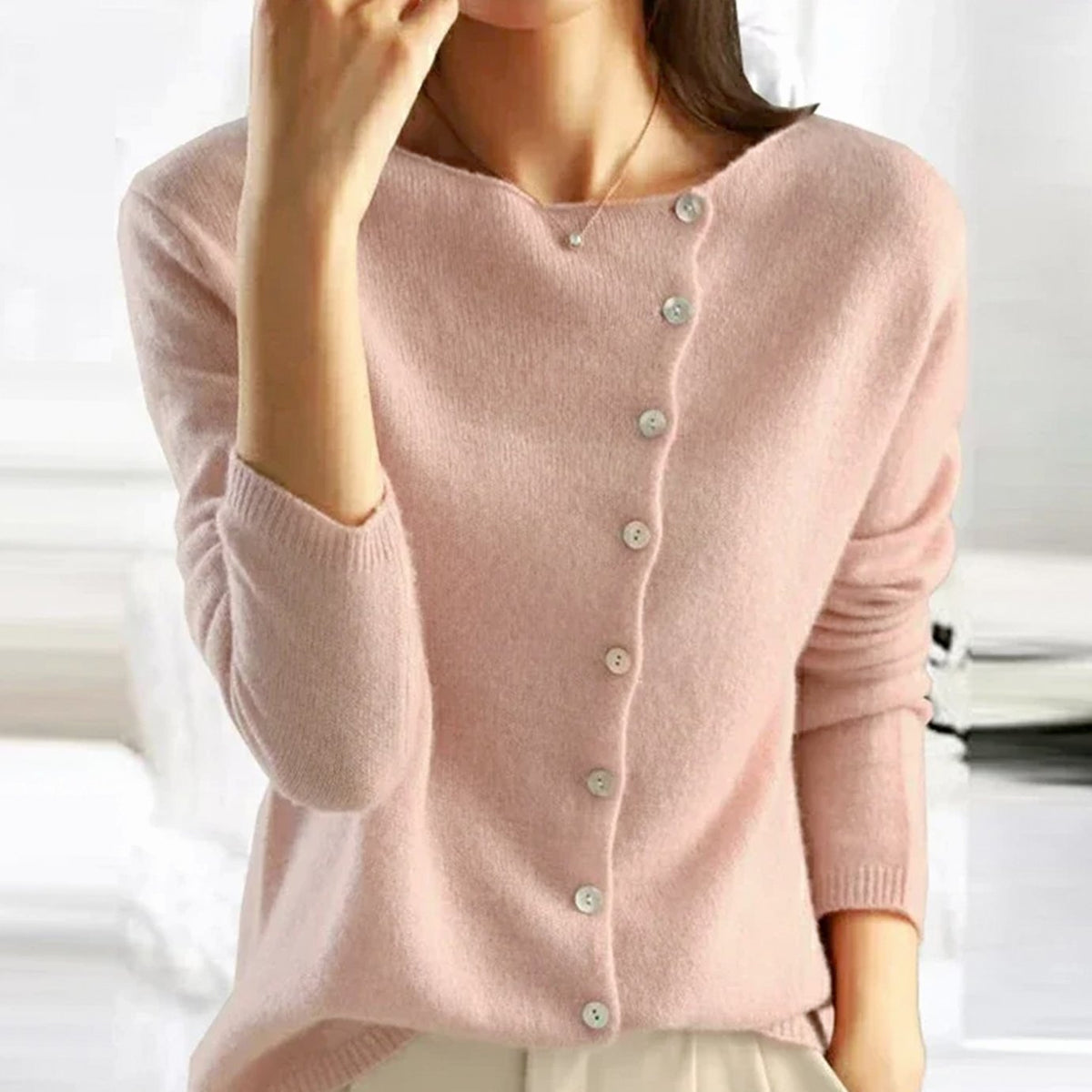Women's asymmetric V-neck cardigan by Homixa featuring soft knit fabric and pearl-tone button-front design.