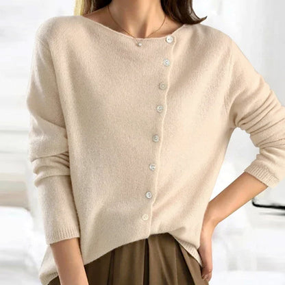 Women's asymmetric V-neck cardigan by Homixa featuring soft knit fabric and pearl-tone button details.