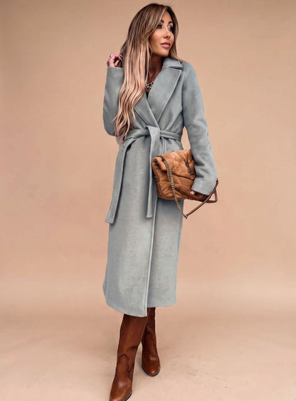 Women's belted knee-length trench coat by Homixa featuring notched lapels and a warm wool-blend fabric.