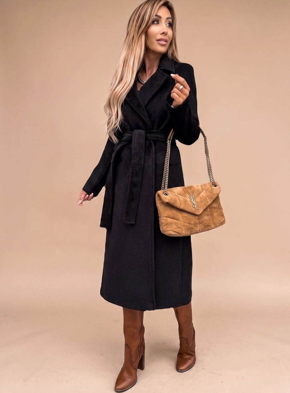 Women's knee-length trench coat by Homixa with belted waist, notched lapels, and wool-blend fabric, shown on a model.