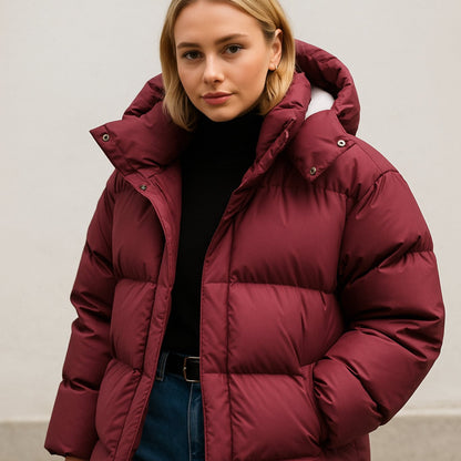 Women's Homixa quilted puffer winter jacket with stand collar and removable hood, showcasing its boxy fit and cozy design.