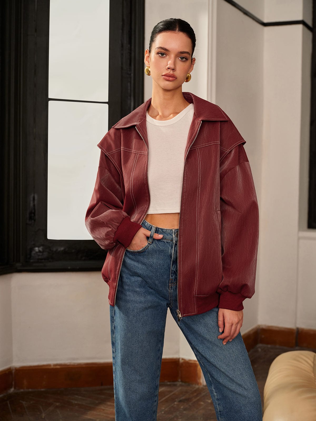 Women's burgundy vegan-leather zip-front jacket by Homixa featuring clean lines and sporty accents.