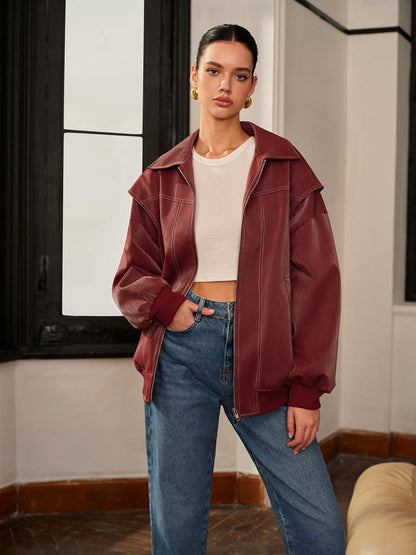 Women's burgundy vegan-leather zip-front jacket by Homixa featuring clean lines and sporty accents.