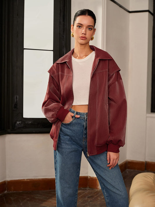 Women's burgundy vegan-leather zip-front jacket by Homixa featuring clean lines and sporty accents.