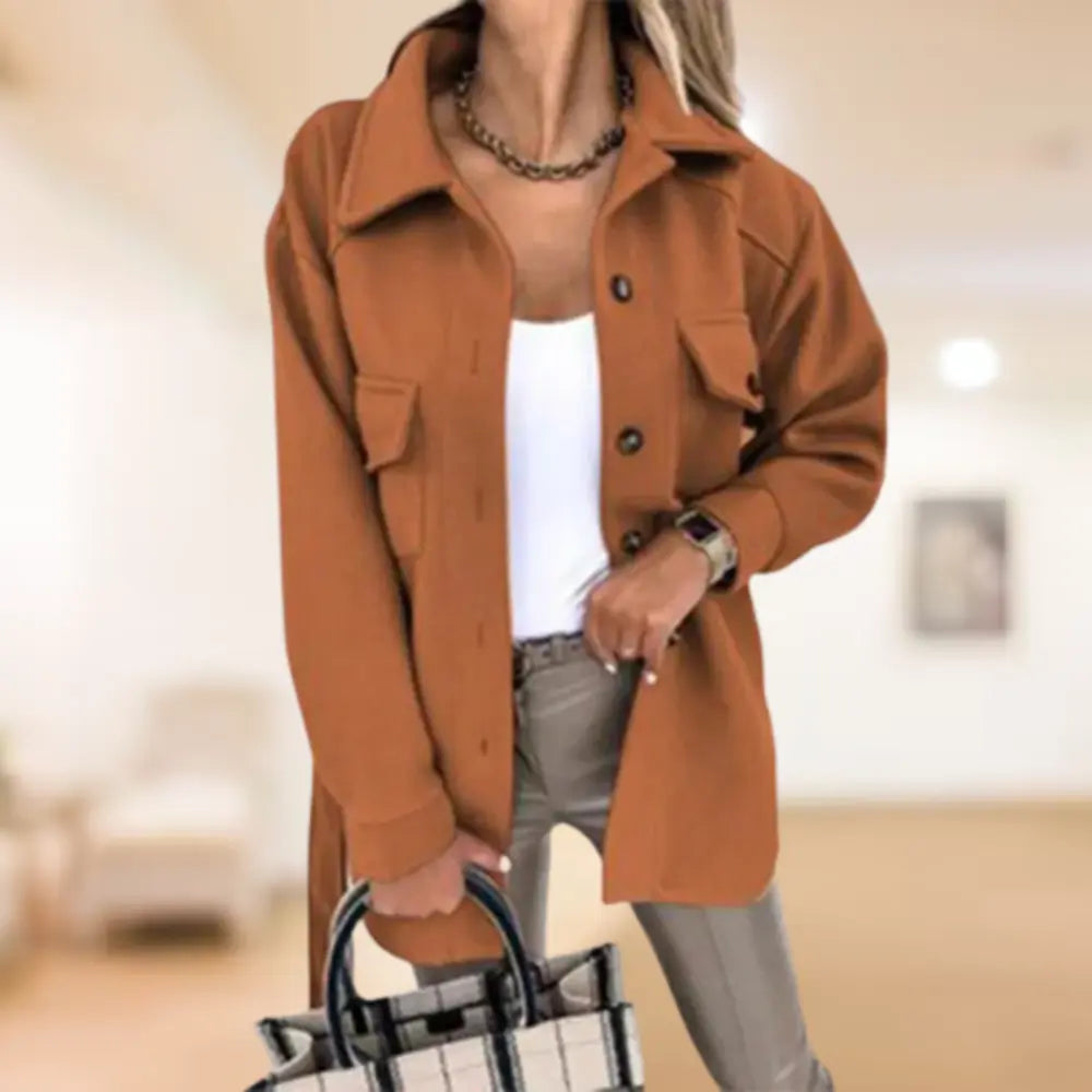 Homixa women's button-front shirt jacket with collared neck, long sleeves, and flap pockets, styled for casual wear.