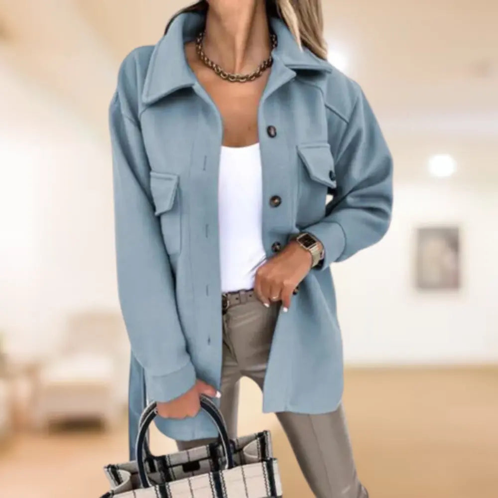 Homixa women's button-front shirt jacket with collared neck, long sleeves, and flap pockets, displayed on a model.