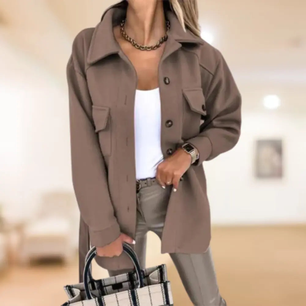Women's Homixa shirt jacket with button front, collared neck, long sleeves, and flap pockets, suitable for casual wear.