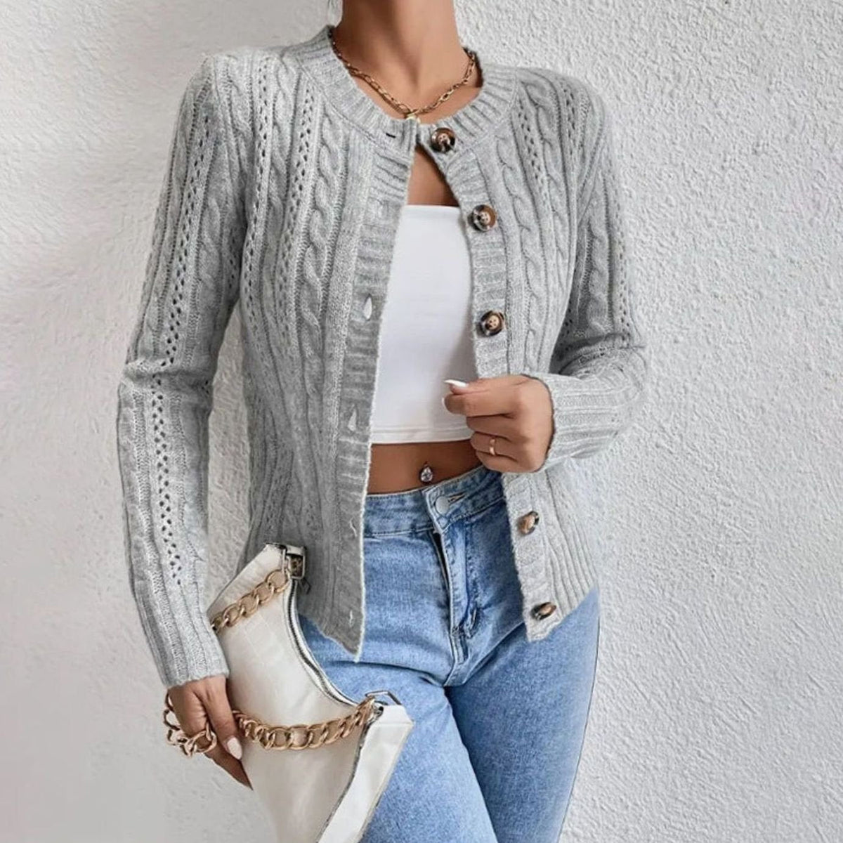 Women’s cable-knit cardigan by Homixa with gold-tone buttons, long sleeves, and a button-front design.