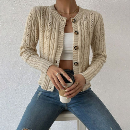 Women's cable-knit cardigan by Homixa with button front, long sleeves, and gold-tone buttons, showcasing a cozy, stylish knitwear design.