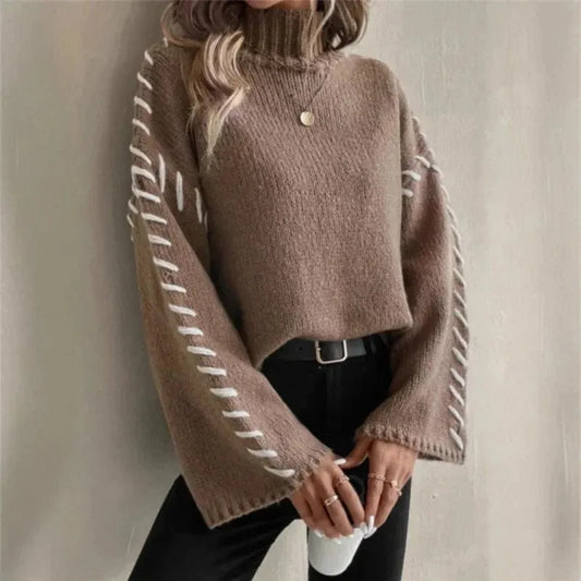 Homixa women's cable-knit sweater with mock neck and contrast-stitched bell sleeves, cozy knit sweater for stylish winter wear.