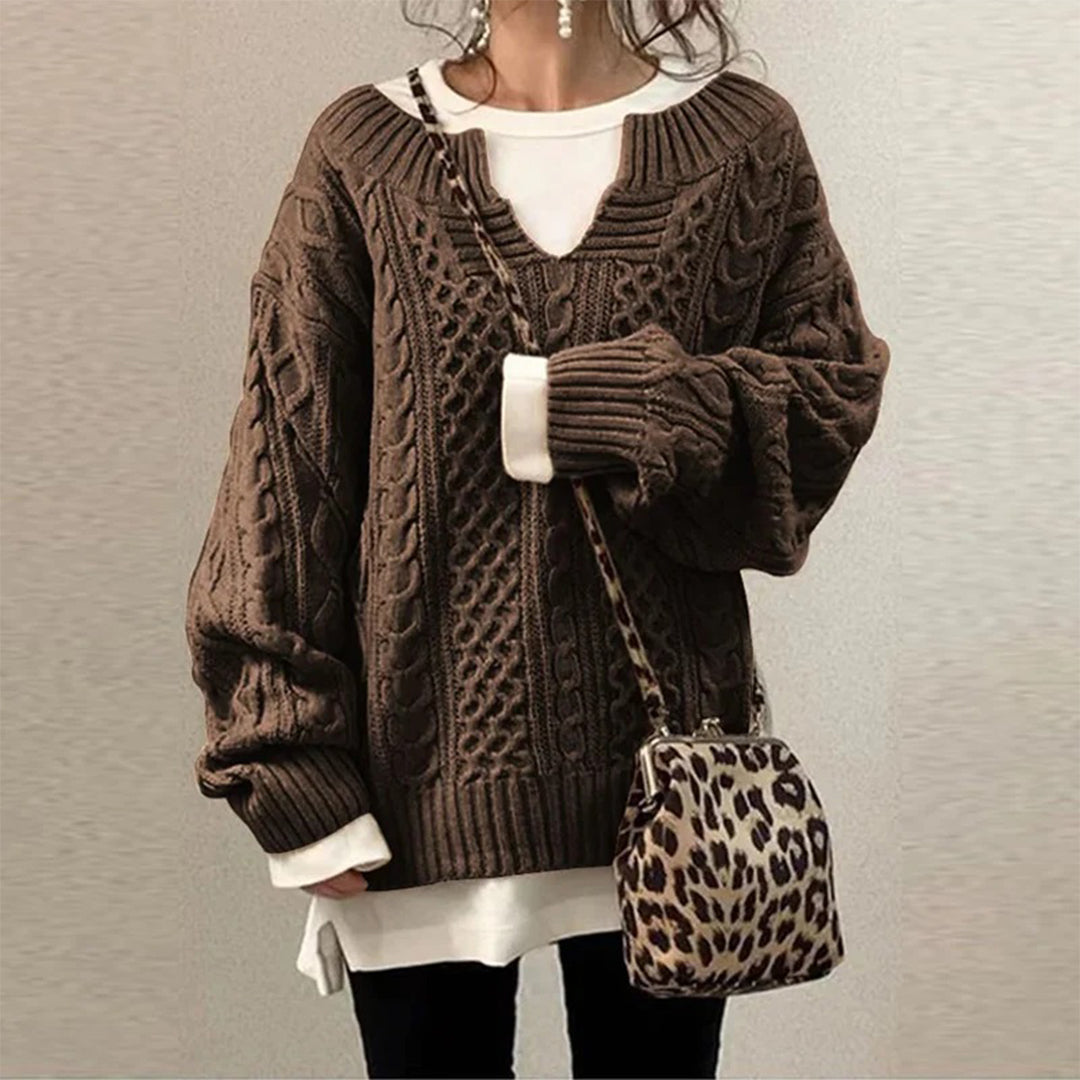 Women’s cable-knit sweater by Homixa with notched neckline and wide ribbed cuffs, stylish and cozy knitwear for women.