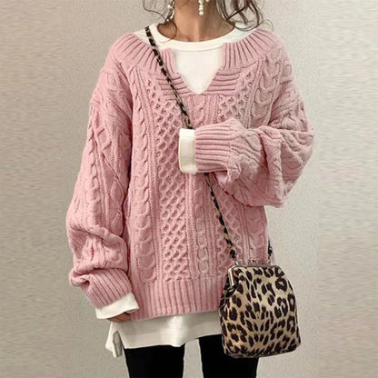 Homixa women's cable-knit sweater featuring a notched neckline and wide ribbed cuffs, cozy and stylish for everyday wear.