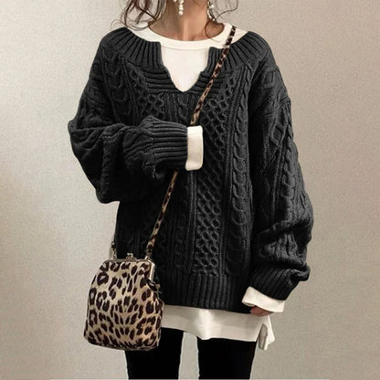 Homixa women's cable-knit sweater featuring a notched neckline and wide ribbed cuffs, cozy and stylish knitwear for women.