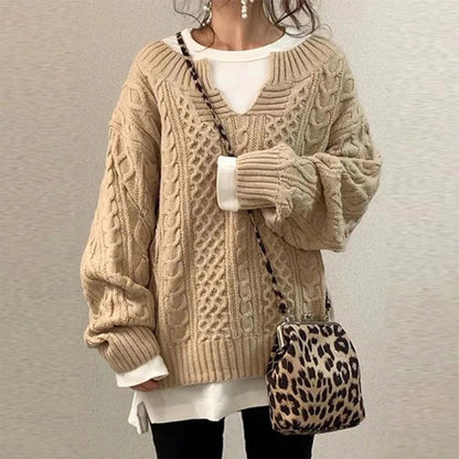 Homixa women's cable-knit sweater with notched neckline and wide ribbed cuffs, cozy and stylish for cold weather.