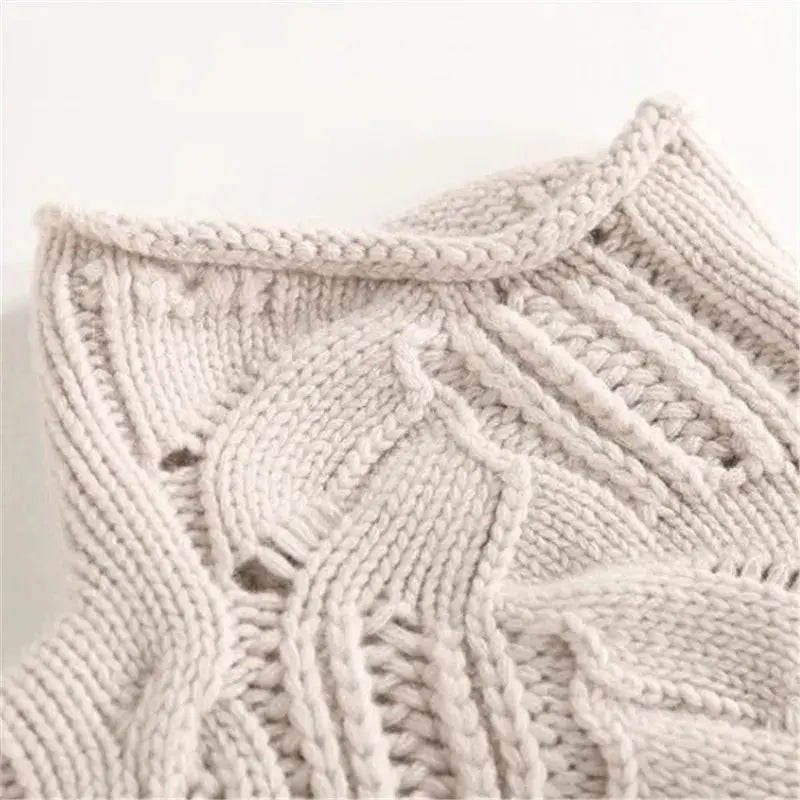 Women's cable-knit turtleneck sweater by Homixa featuring openwork details and ribbed cuffs, stylish and cozy for fall.