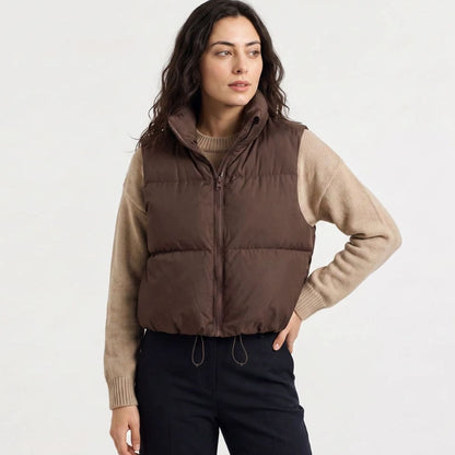 Women's casual cropped quilted puffer vest by Homixa featuring a high collar, sleeveless design, and zip-front closure.