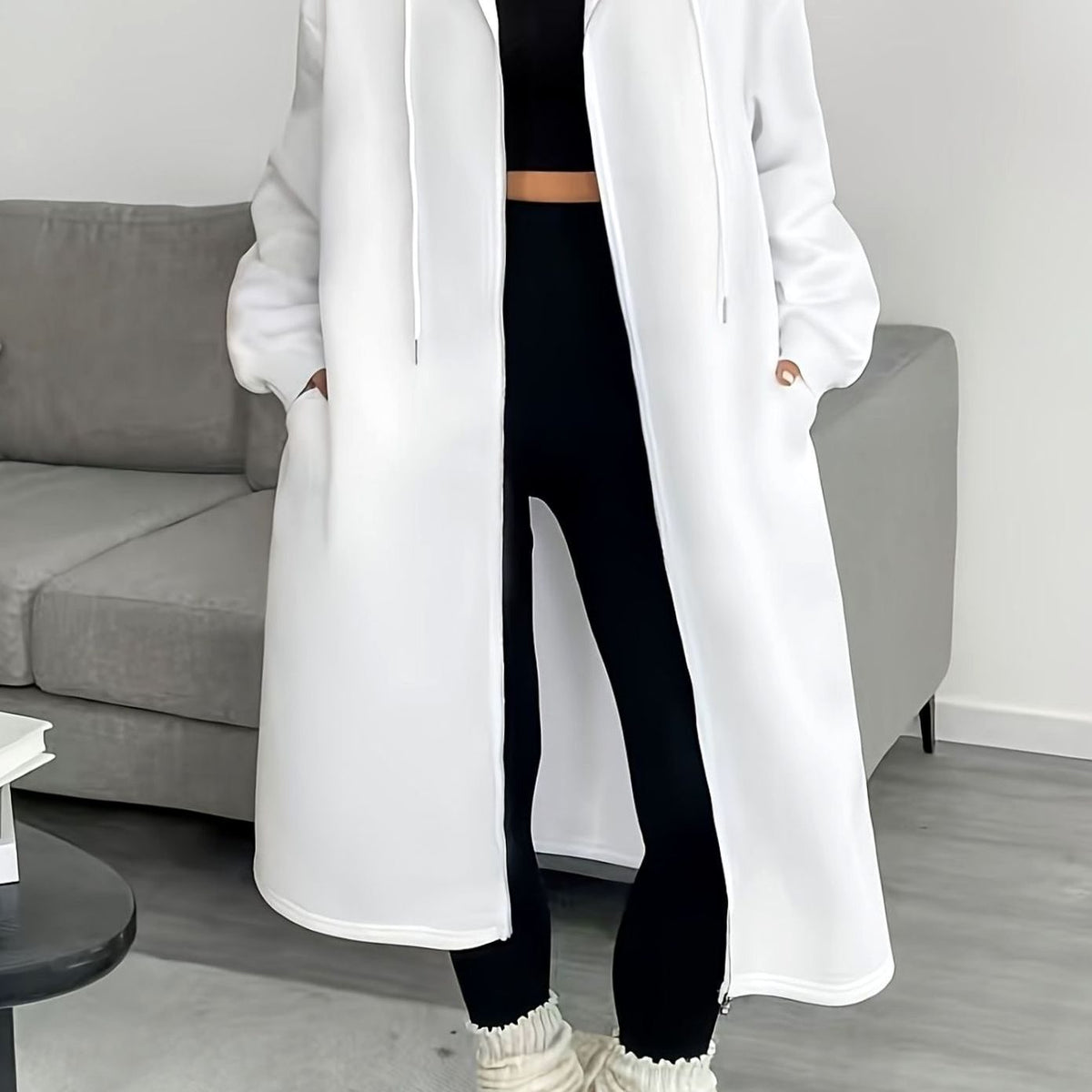 Women’s oversized casual hooded zip coat by Homixa, long winter coat with side pockets and a cozy hood.