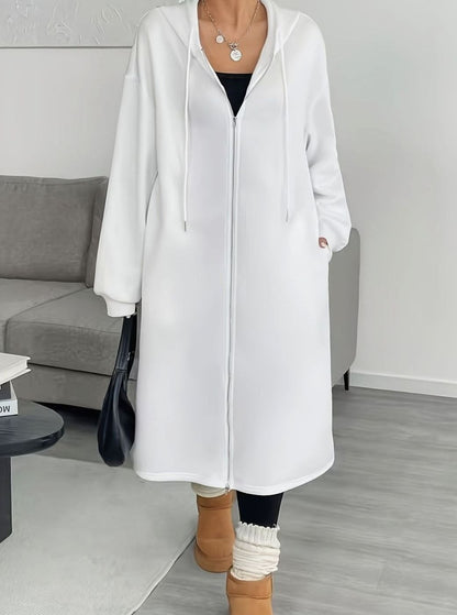 Women's oversized hooded zip-front winter coat with side pockets, casual long coat by Homixa, suitable for cold weather.