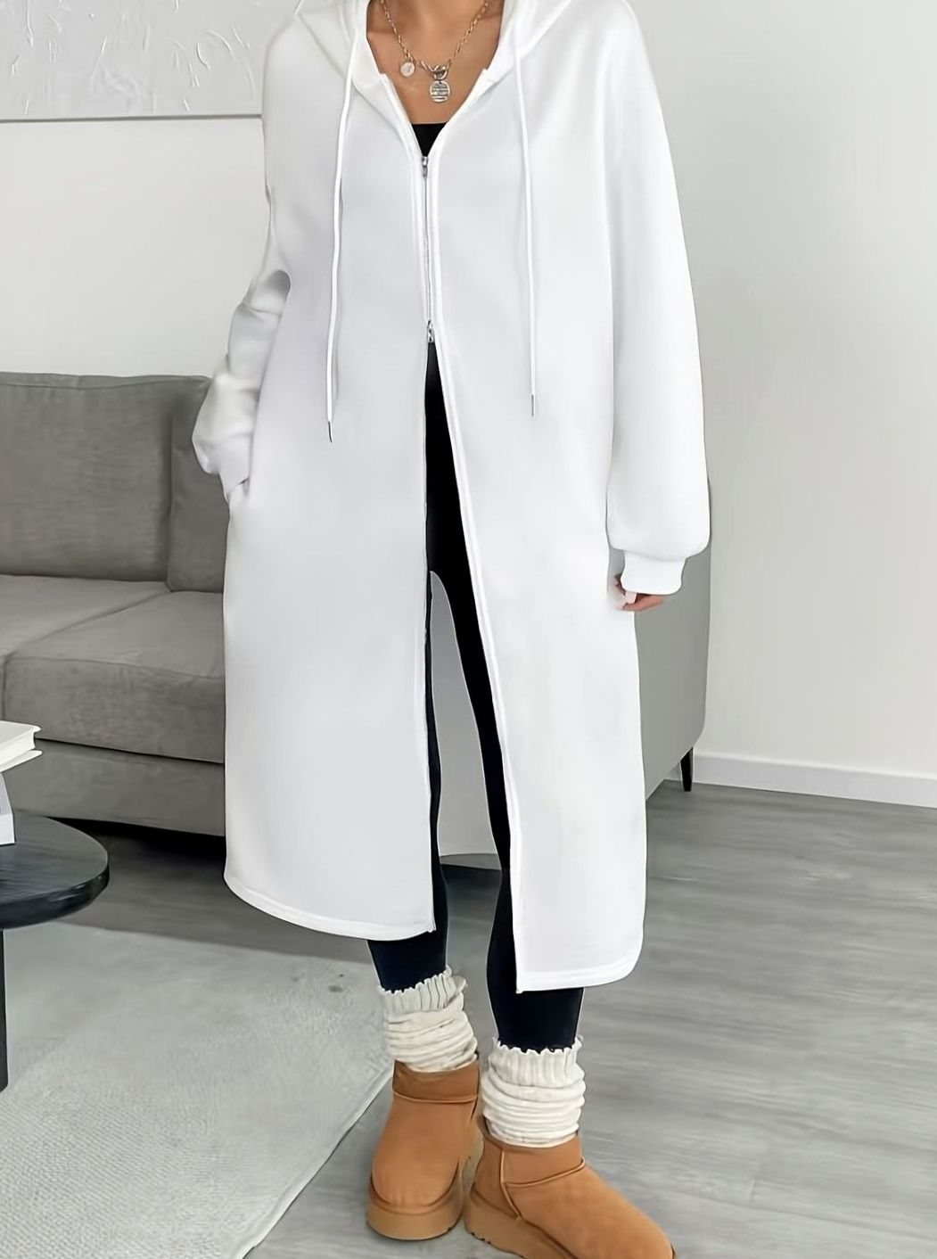 Women’s oversized hooded zip coat by Homixa, long winter coat with side pockets, casual and warm for winter wear.