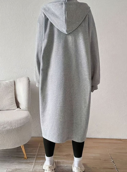 Women's oversized hooded zip front winter coat with side pockets, casual long coat by Homixa, suitable for cold weather.