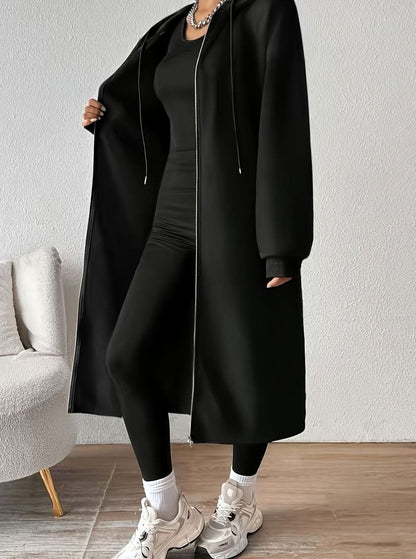 Women’s oversized hooded zip coat by Homixa, long winter coat with side pockets and casual relaxed fit.