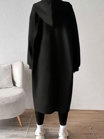 Women's oversized hooded zip-front winter coat by Homixa with side pockets, casual long coat, cozy and stylish for cold weather.