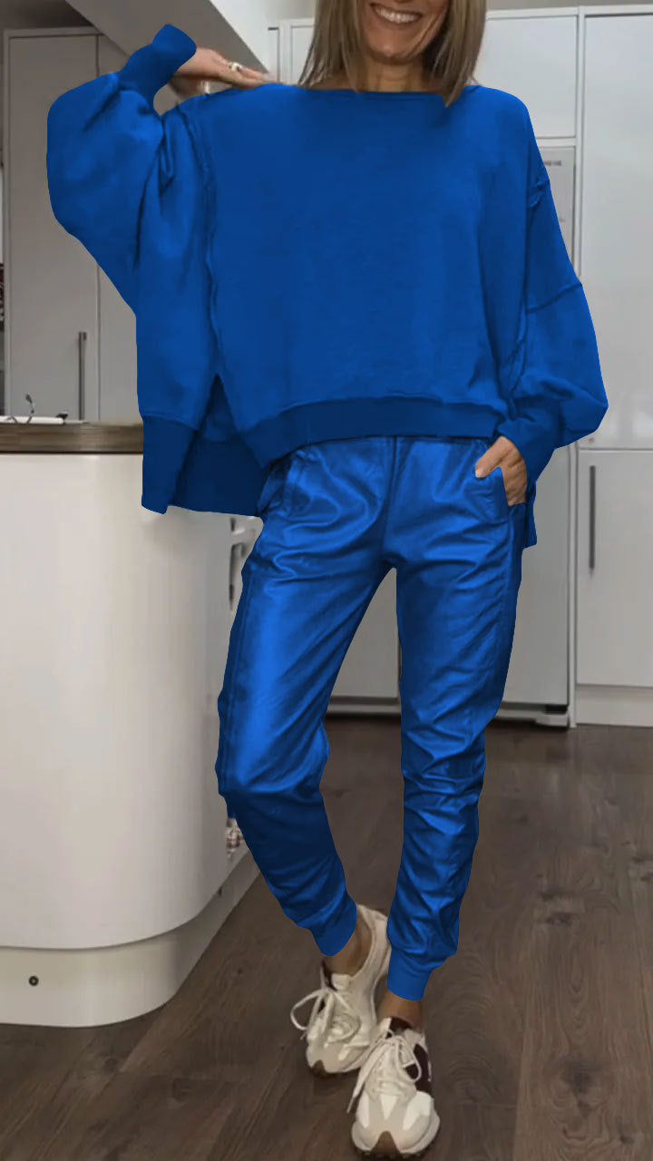 Women’s casual oversized two-piece set by Homixa featuring a cozy sweater and satin pants, styled for comfortable everyday wear.