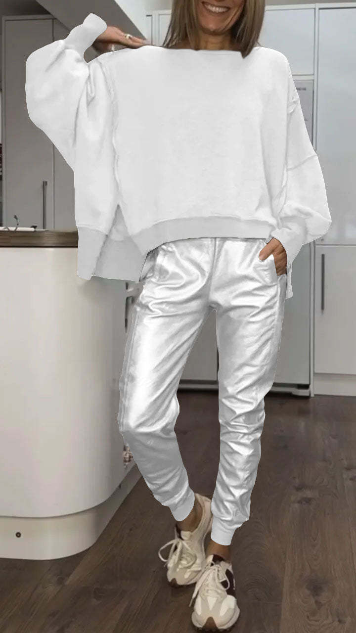 Women's oversized casual two-piece set by Homixa featuring a cozy sweater and satin pants, perfect for relaxed everyday wear.
