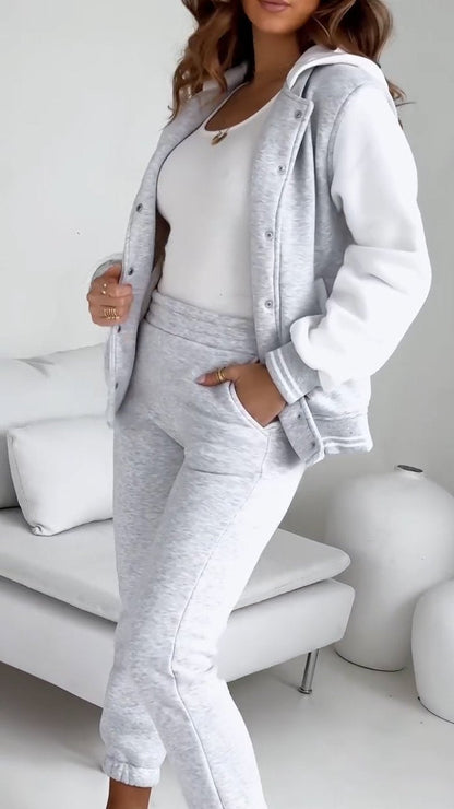 Women’s casual streetwear bomber and jogger two-piece set by Homixa, featuring elastic waist and comfortable fit.