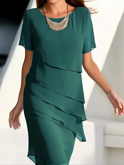 Women's chiffon tiered-layer cocktail dress by Homixa featuring a crew neck and short flutter sleeves, displayed on a dress form.
