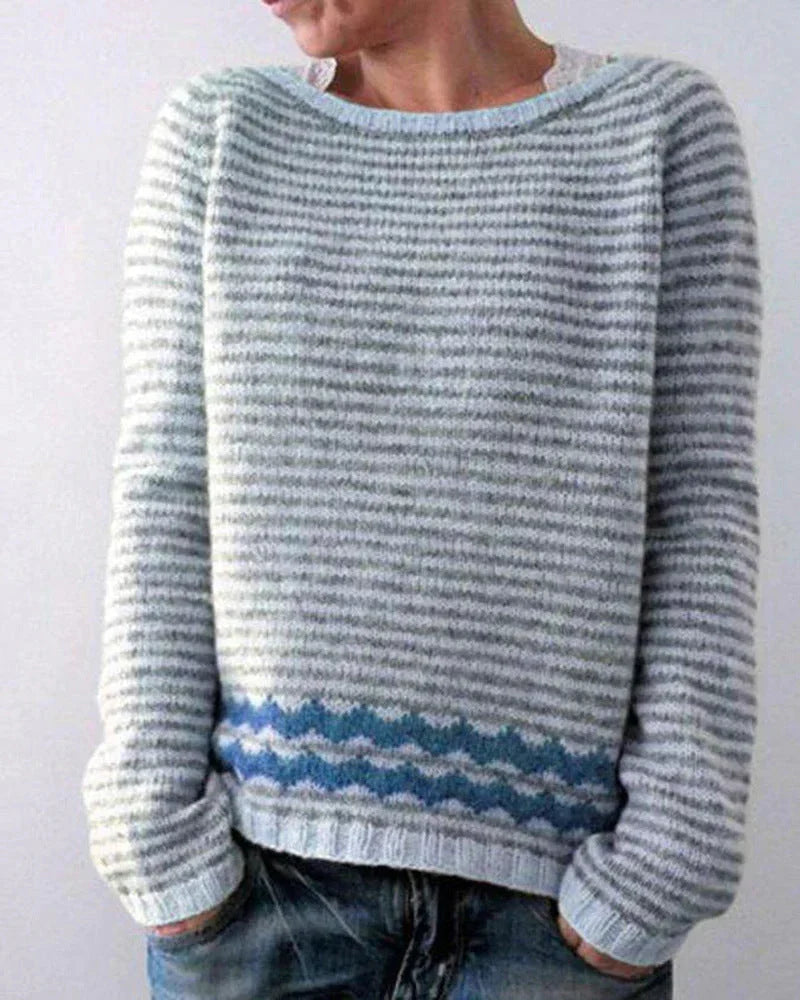 Women's Christmas sweater by Homixa featuring a soft feel, relaxed fit, and festive Nordic pattern.