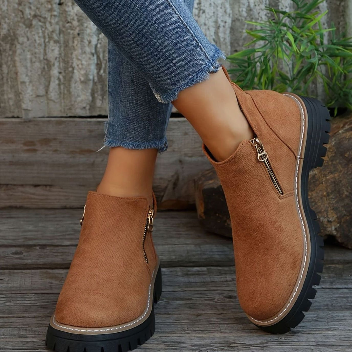Homixa women's animal print chunky platform booties with side zip, cushioned insole, and rugged lug sole for stylish comfort.