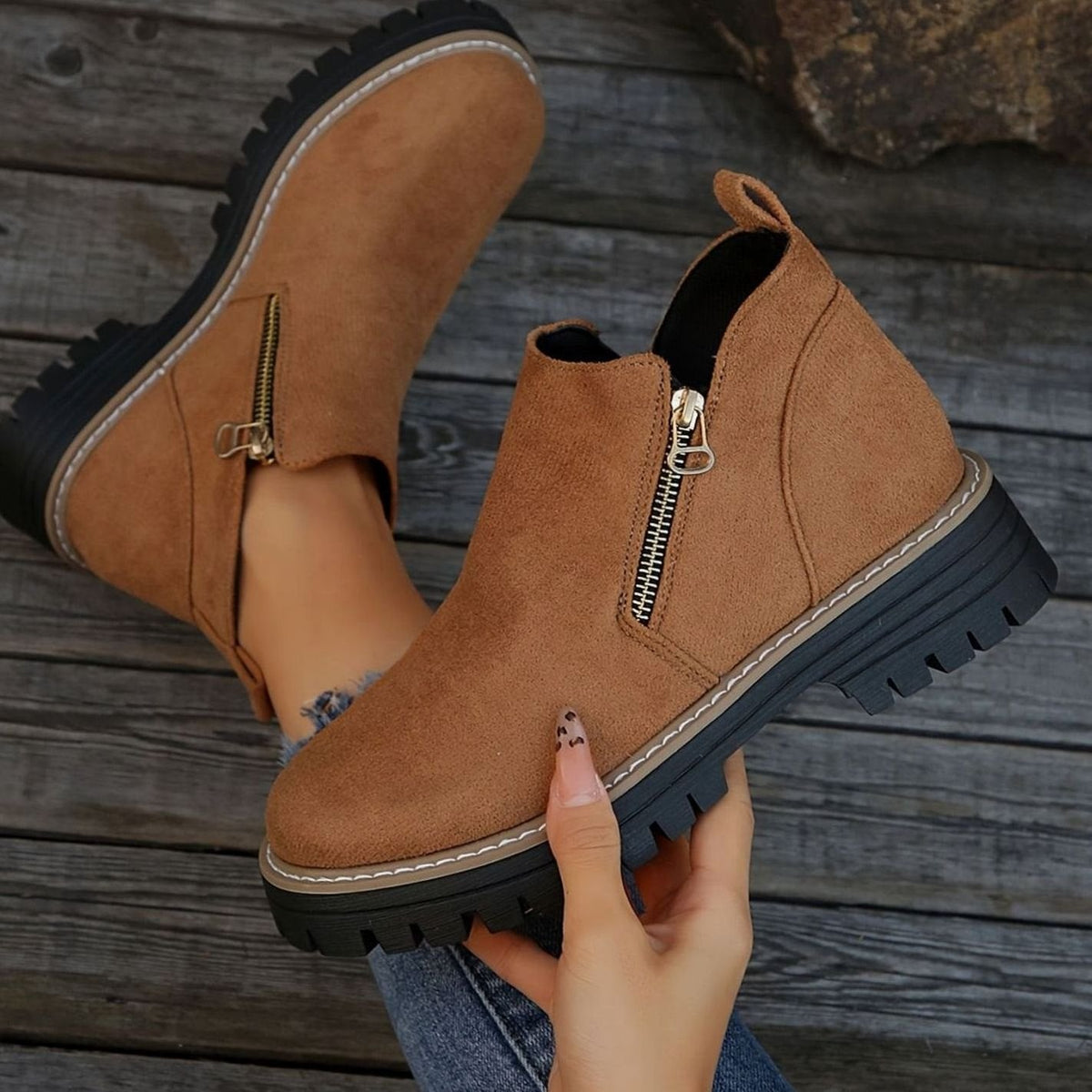Animal print women's chunky platform booties by Homixa with side zip, cushioned insole, and rugged lug sole.