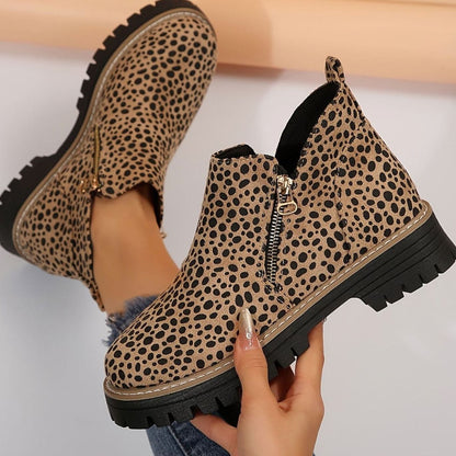 Animal print women's chunky platform booties by Homixa featuring side zip, cushioned insole, and lug sole.